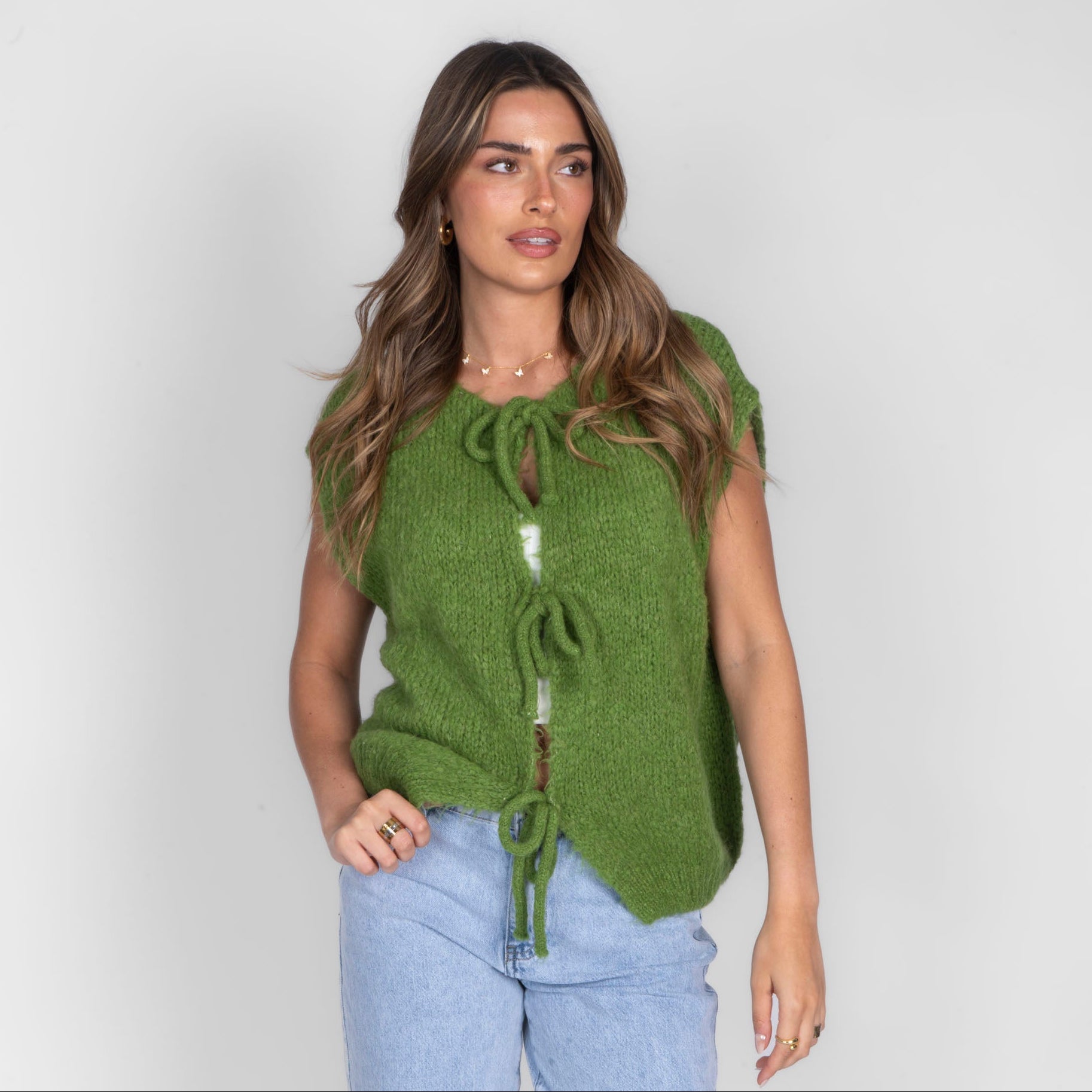 Strickweste mit Schleifen