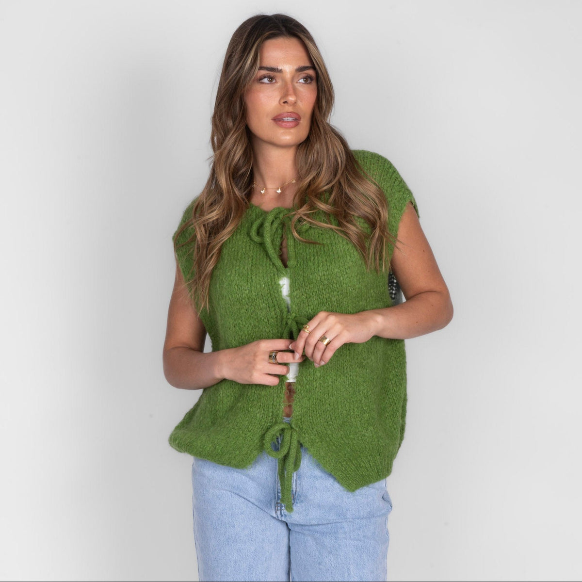 Strickweste mit Schleifen